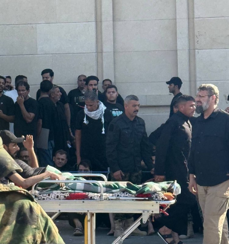 Iraqi Citizen Attends Mourning Ceremony